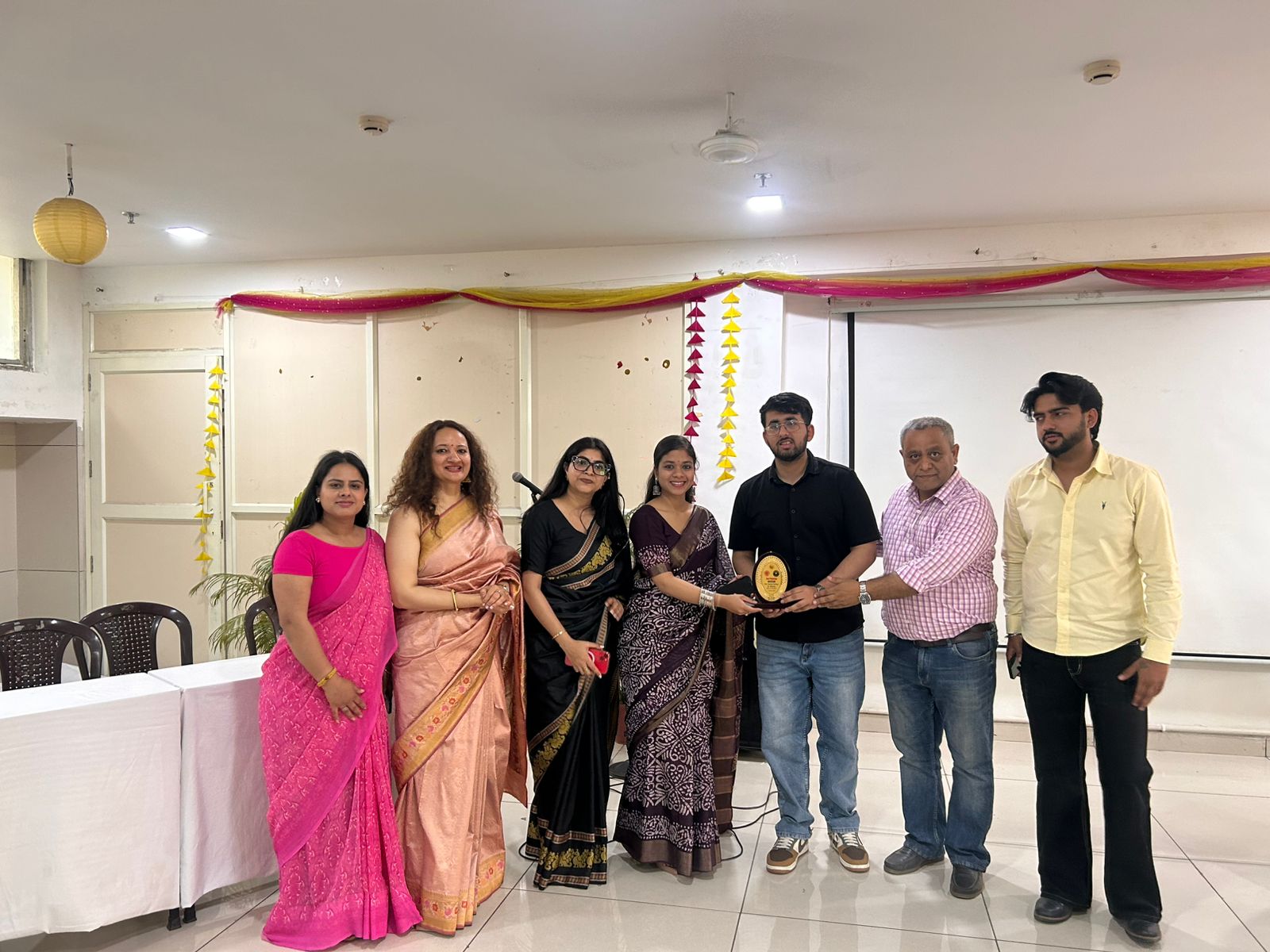 Ansh Verma with fellow performers at a music event.
